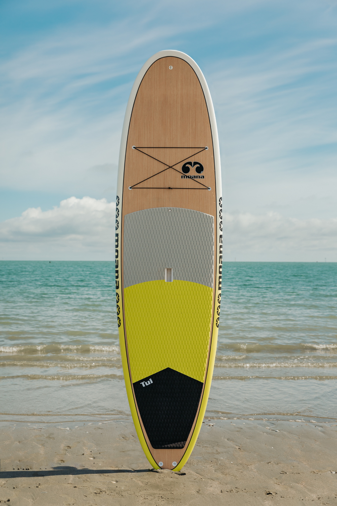 Moana Tui yellow stand up paddleboard on the beach