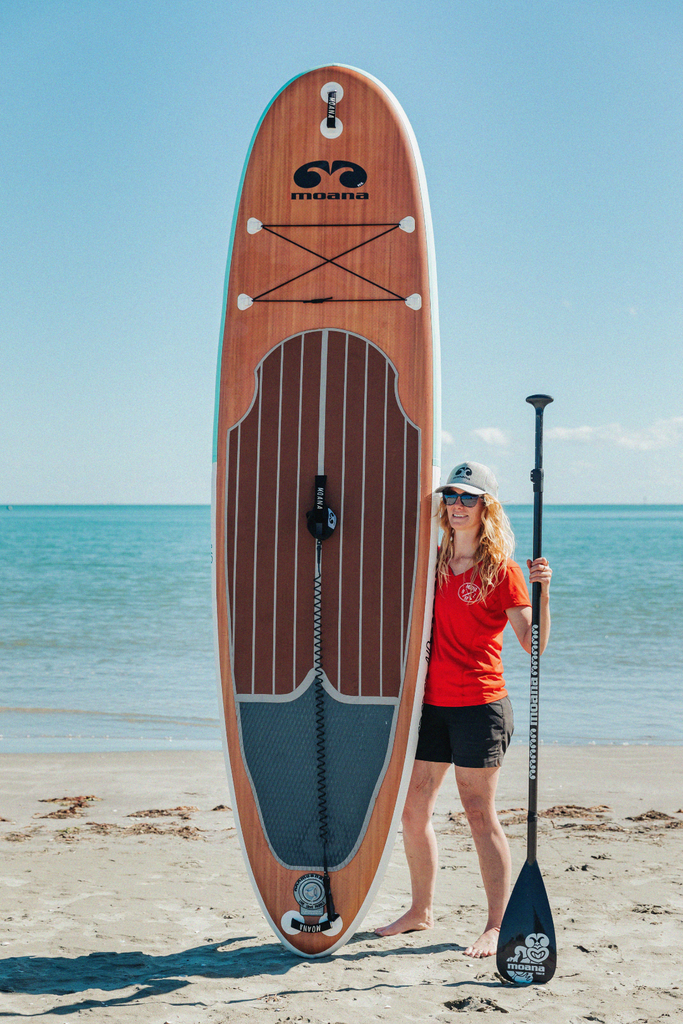 Moana Kotare 10'6" inflatable stand up paddleboard on the beach