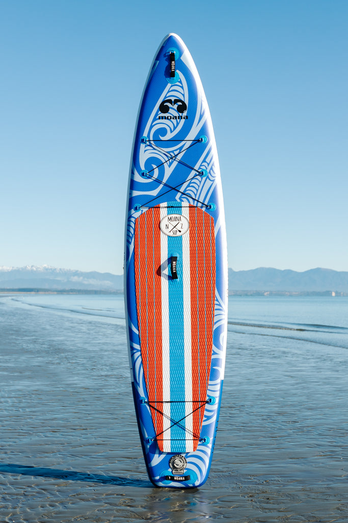 Moana Kehu 11' inflatable stand up paddleboard on the beach