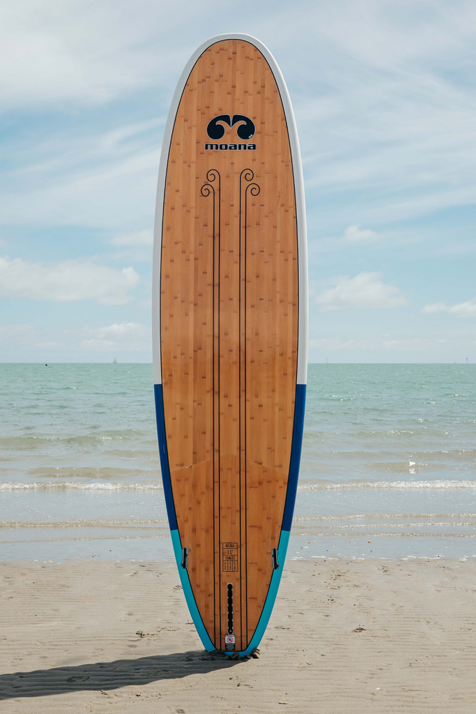 Moana Tumeke blue stand up paddleboard on the beach